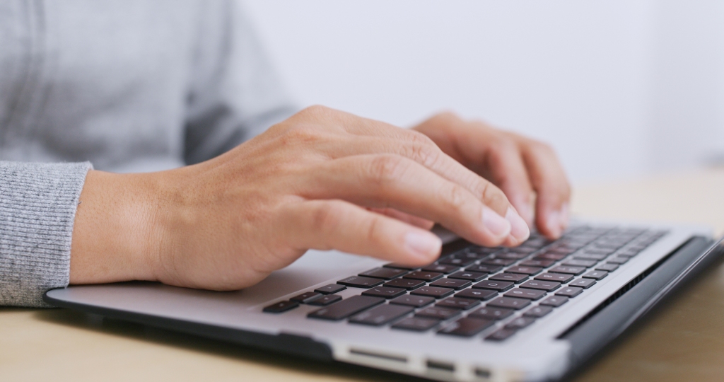 Man working on laptop computer